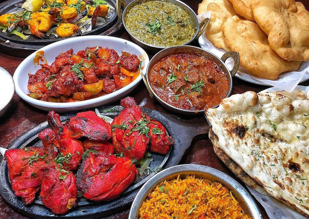 Indian feast of tandoori, curry, biryani, and naan at Taj Palace in Las Vegas